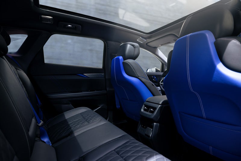 Back Seat View of the 2026 OPTIQ-V Blue Front Seats, Sun Roof, and Interior | Eric von Schledorn Cadillac in Saukville WI